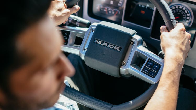 Ergonomic steering wheel, with accessible controls to infotainment and cruise control.