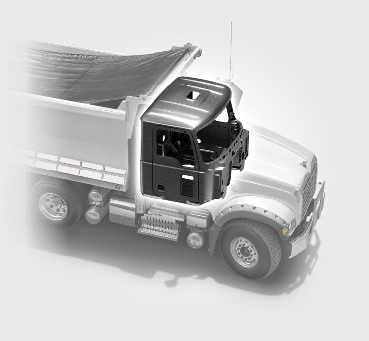 Mack Granite truck with a semi-transparent view highlighting its reinforced steel cab design.