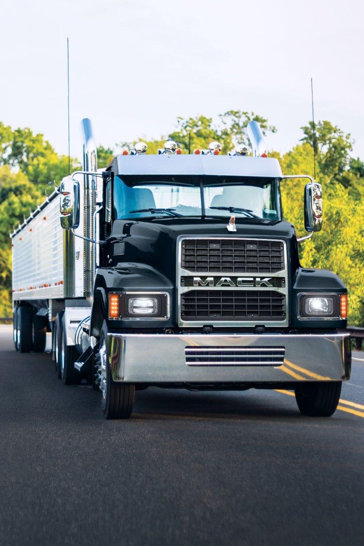 Black Mack Pinnacle truck on a city street