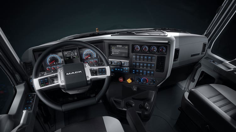 Closeup of the ergonomic inspired dash wraps around drivers.